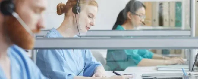 Healthcare Call Center Agents Working In A Modern Office