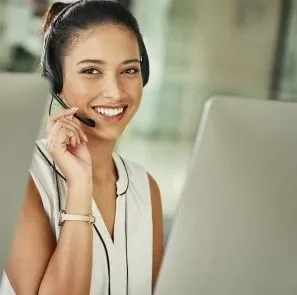 A Woman At A Call Center Answering A Call