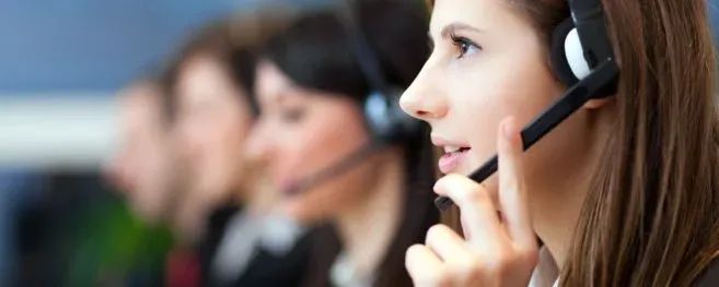 Call Center Agent Working With a Headset