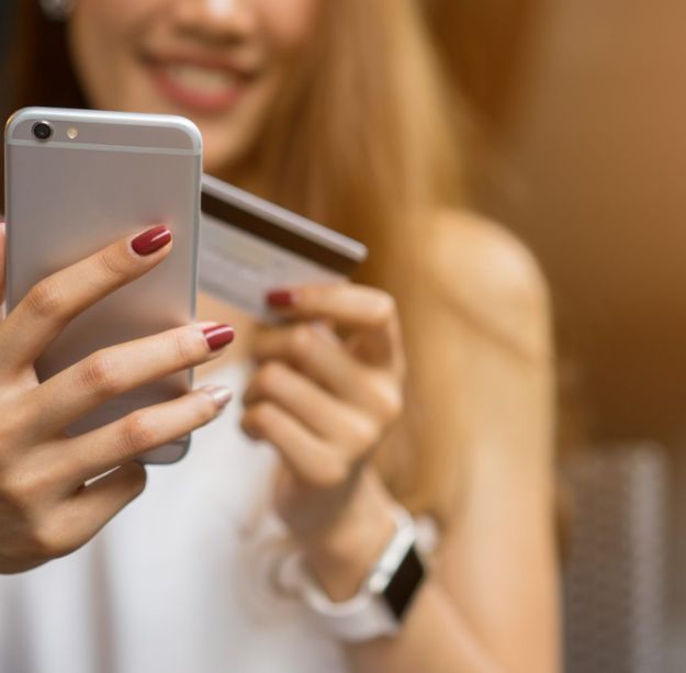 Woman Holding Smartphone