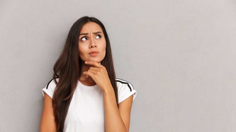 Woman Looking Up and Thinking