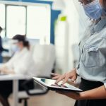 Employee from marketing department checking company statistics Employee from marketing department checking company statistics